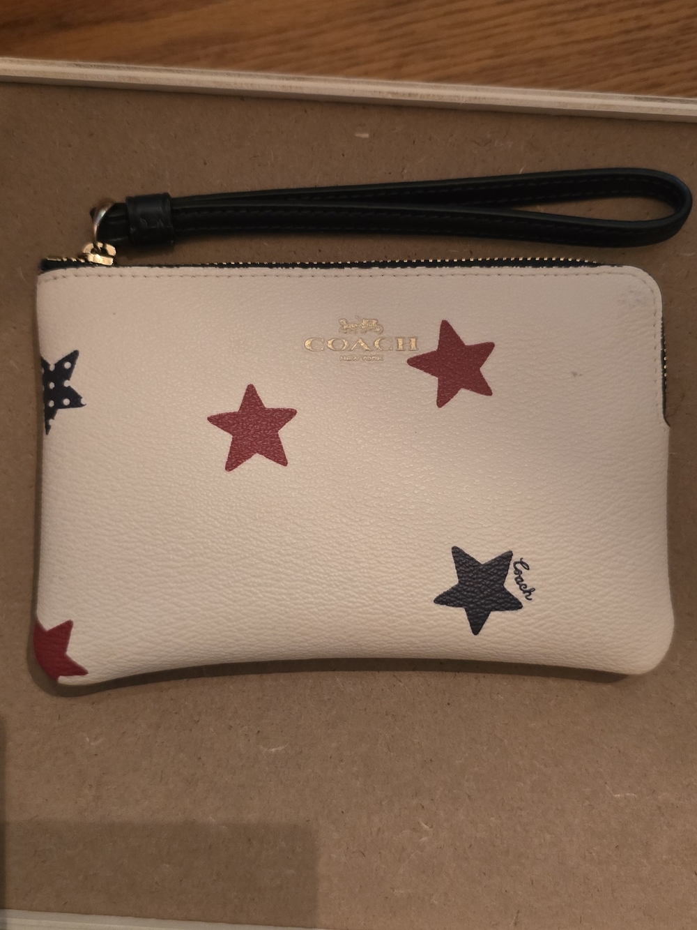 Coach White Leather Star Print Wristlet with Black Strap